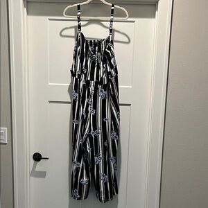 NEW Torrid Black and White Jumpsuit with Blue Floral Design